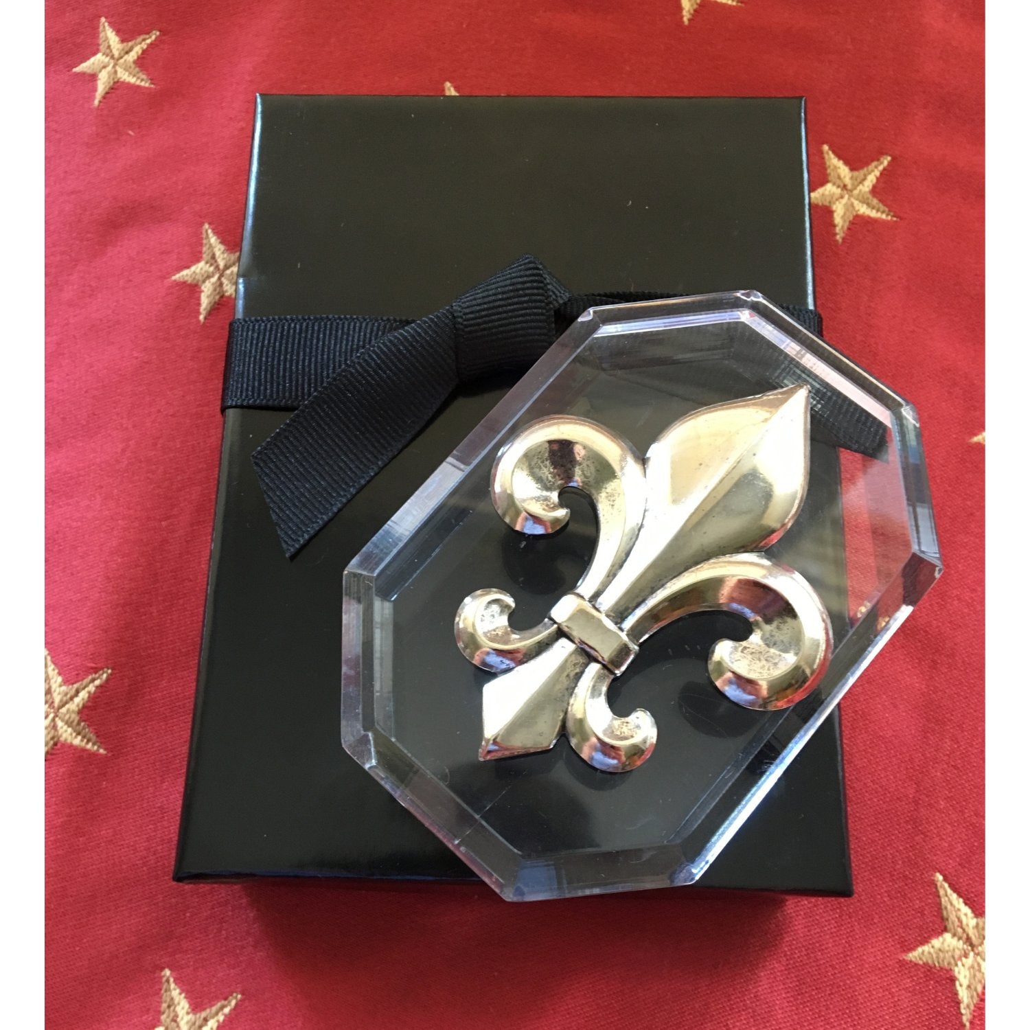 Paperweights by Classic Legacy are embellished with silver and gold medallions.