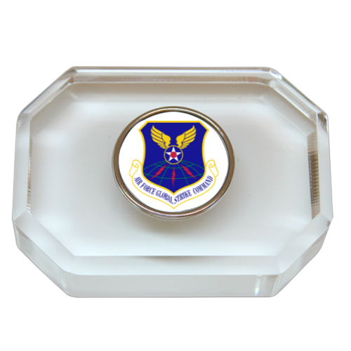 A custom octagonal paperweight with Ari Force logo