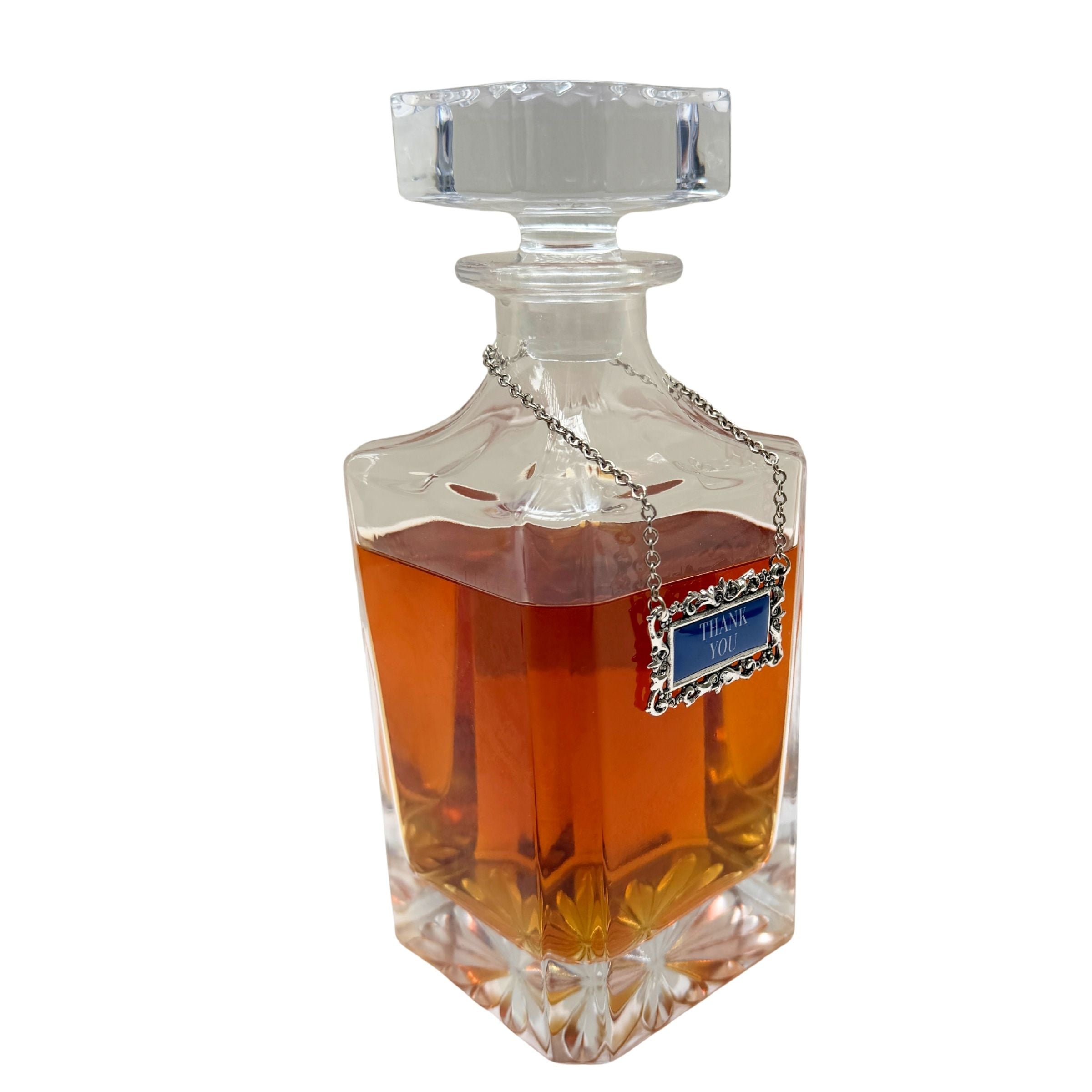 Decanter with silver and blue "Thank-you" label marker