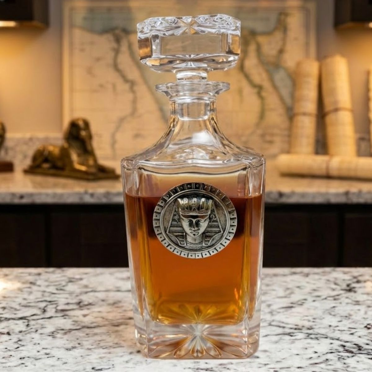 The Egyptian decanter features a large silver medallion of an Egyptian god. This is a great gift for a bourbon lover who likes to travel and also loves Egypt.