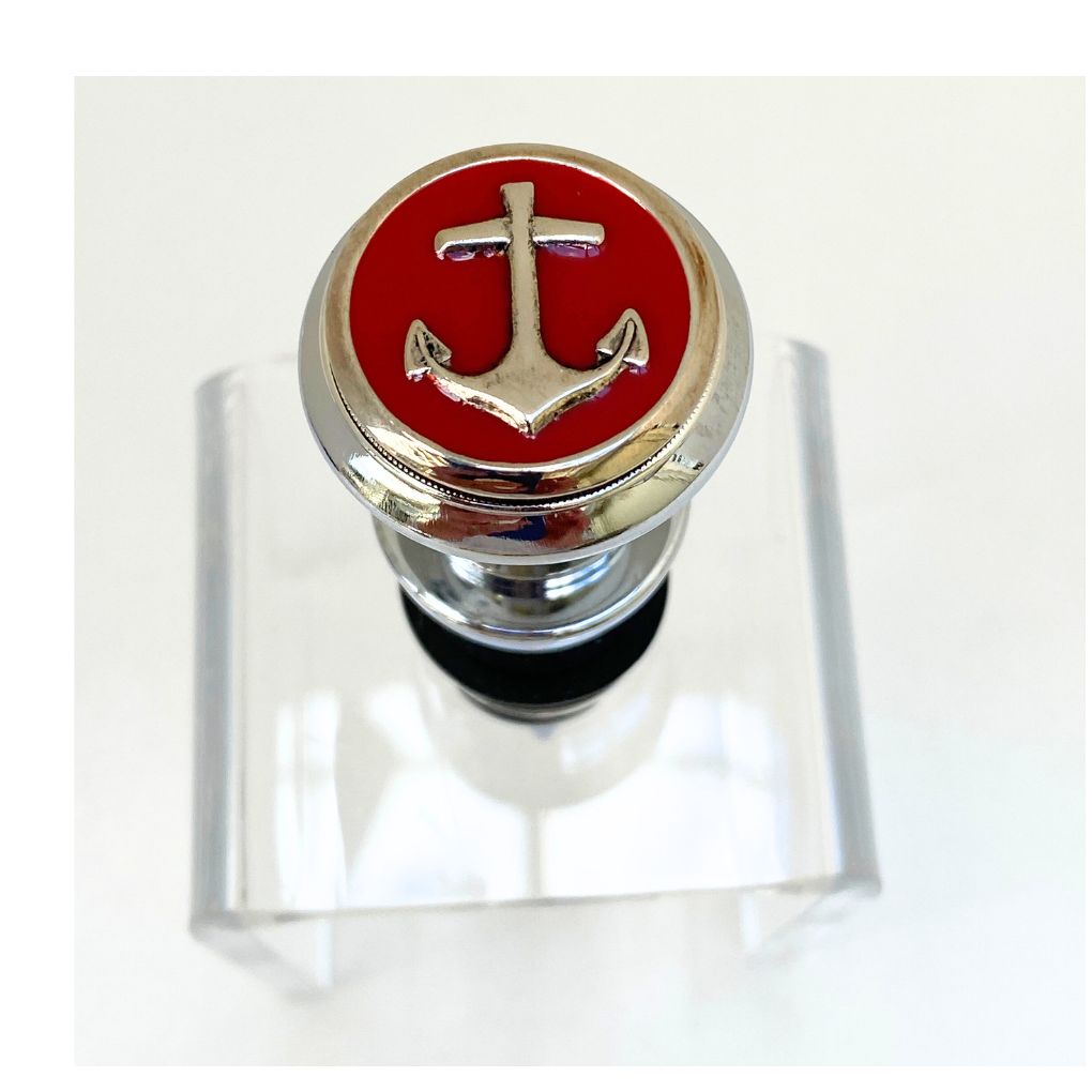 Wine bottle stopper with red anchor design on a white background