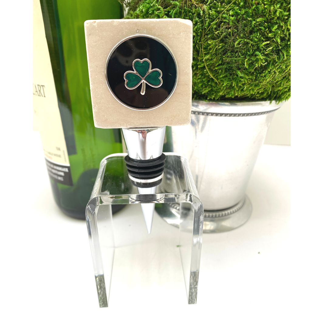 Irish Shamrock Marble Top Wine Bottle stopper shown in a clear display