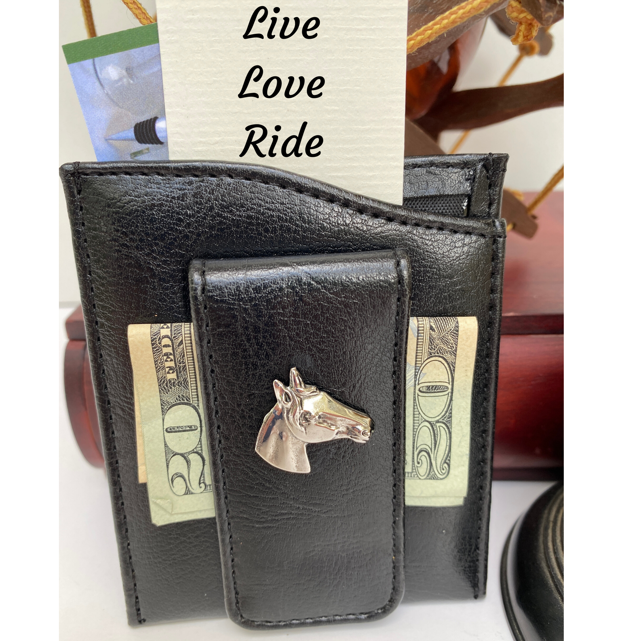 Black faux leather money with silver horse head and quote Love, Love, Ride The money clip holds credit cards, business cards, and cash