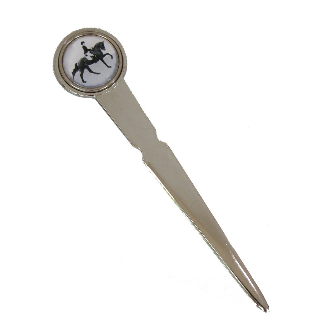 A silver letter opener with a round dressage equestrian image on the handle.