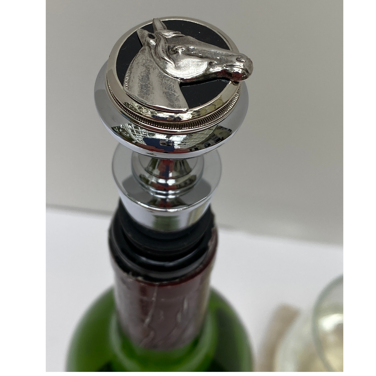 bottle stopper with silver horse head