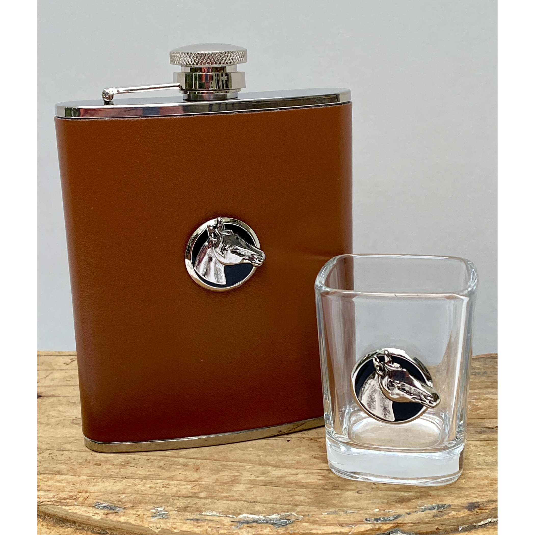 leather flask with silver horse and shot glass with silver horse head