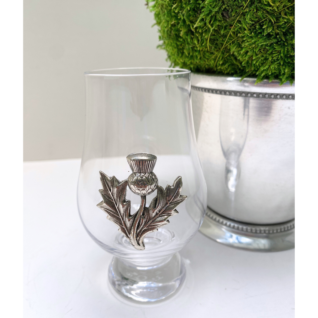 Glencairn Whisky Glasses by Classic Legacy are embellished with  silver medallion.  Themes include the Scottish thistle, initials, and custom logos.