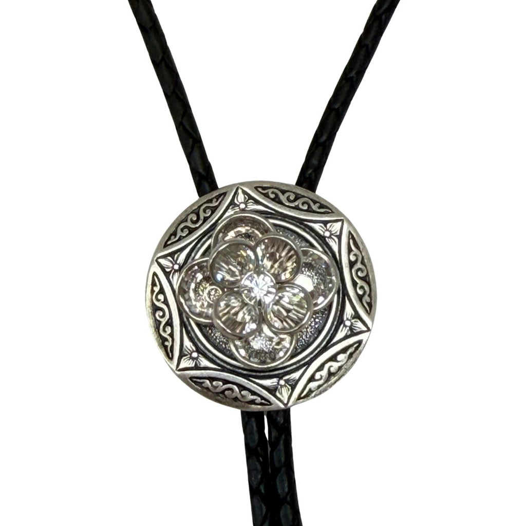 This Classic Legacy bolo tie features a silver Western-style setting with an extra-large, multi-faceted clear crystal.  The black leather cord is 40" long and tipped with classic silver tips.   The pendant is 1.25" in diameter.  This accessory is perfect for Western events and weddings.   It comes in a white gift box.