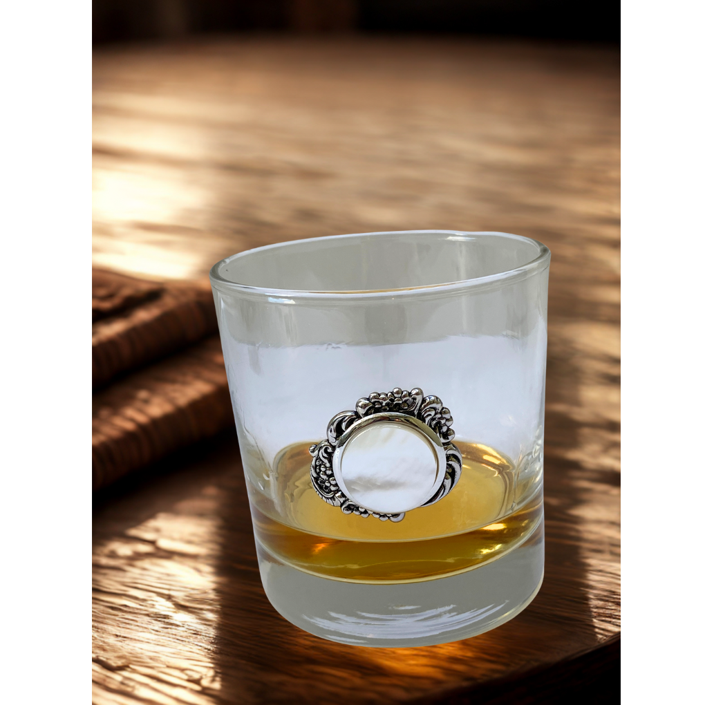 Bourbon Glass with Silver Setting and Mother Of Pearl Setting on Wood Table