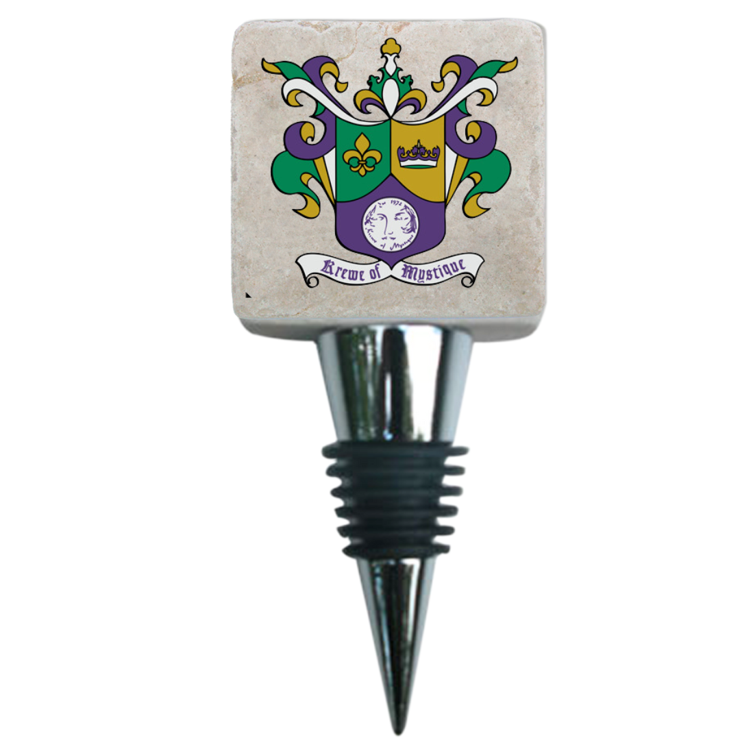 A marble wine bottle stopper with a custom Krewe logo design in purple, green, and gold colors, featuring a central emblem and the text 'Bienville'.