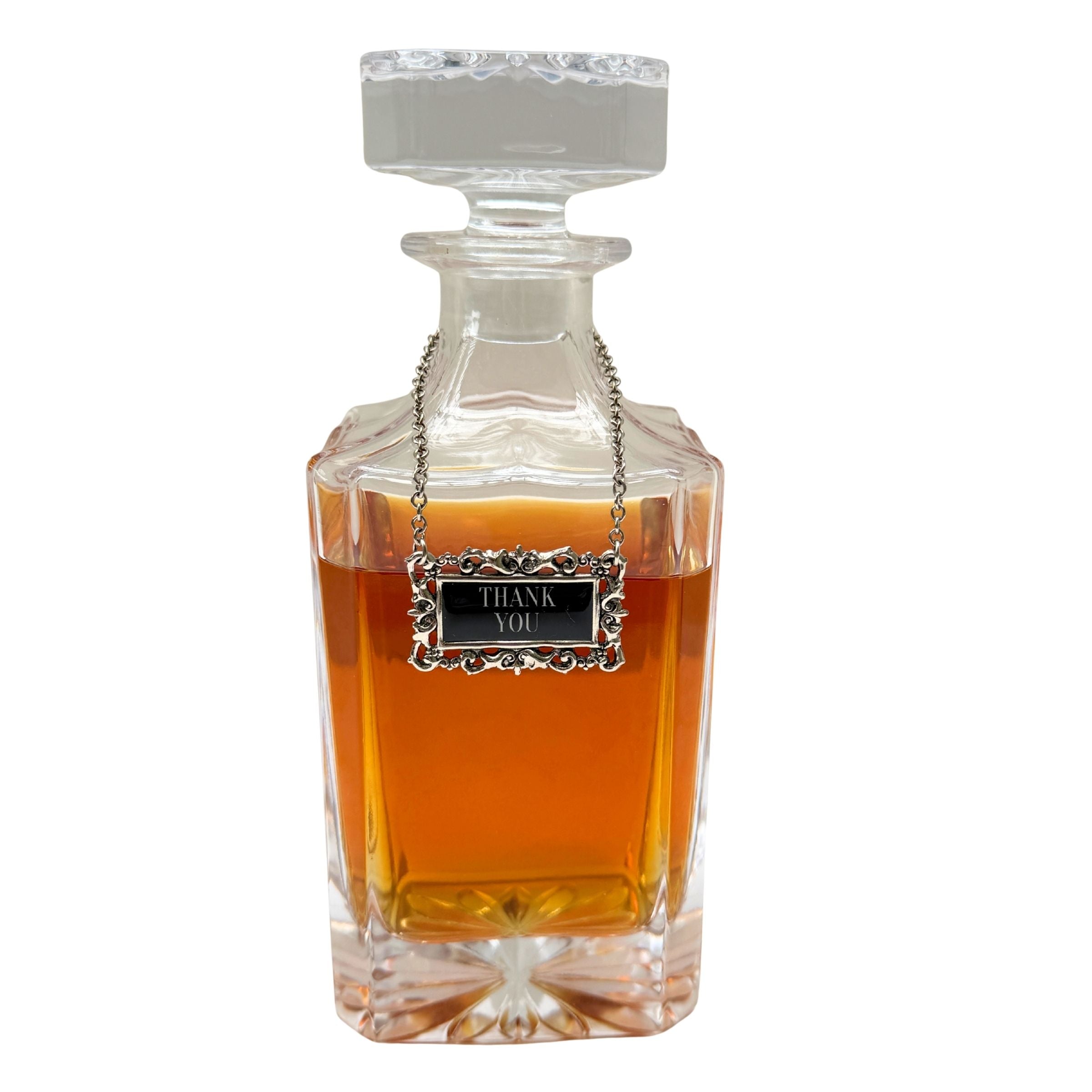 Decanter with  silver and black "Thank-you" label marker