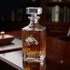 Decanter with Silver horse head is the perfect gift for the man who loves horses and bourbon.   This decanter is sitting on a wood counter in a home bar.