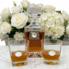Decanter set with Silver Medallion and Mother Of pearl.   The set includes a large decanter with two bourbon  glasses.   All have Mother-of-Pearl medallions.   This is a perfect gift to celebrate the  30th year Pearl Anniversary 