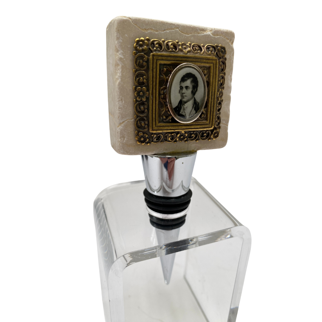 Robert Burns Marble Wine Bottle Stopper in a bottle stopper display holder
