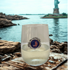 Stemless wine glass America 250 with Statue of Liberty in background