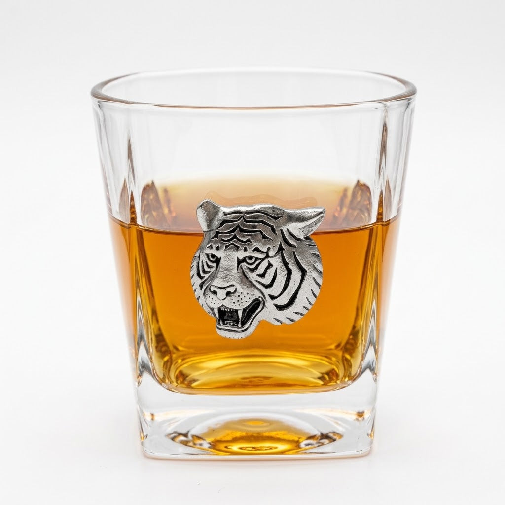 tiger bourbon glass half full of bourbon