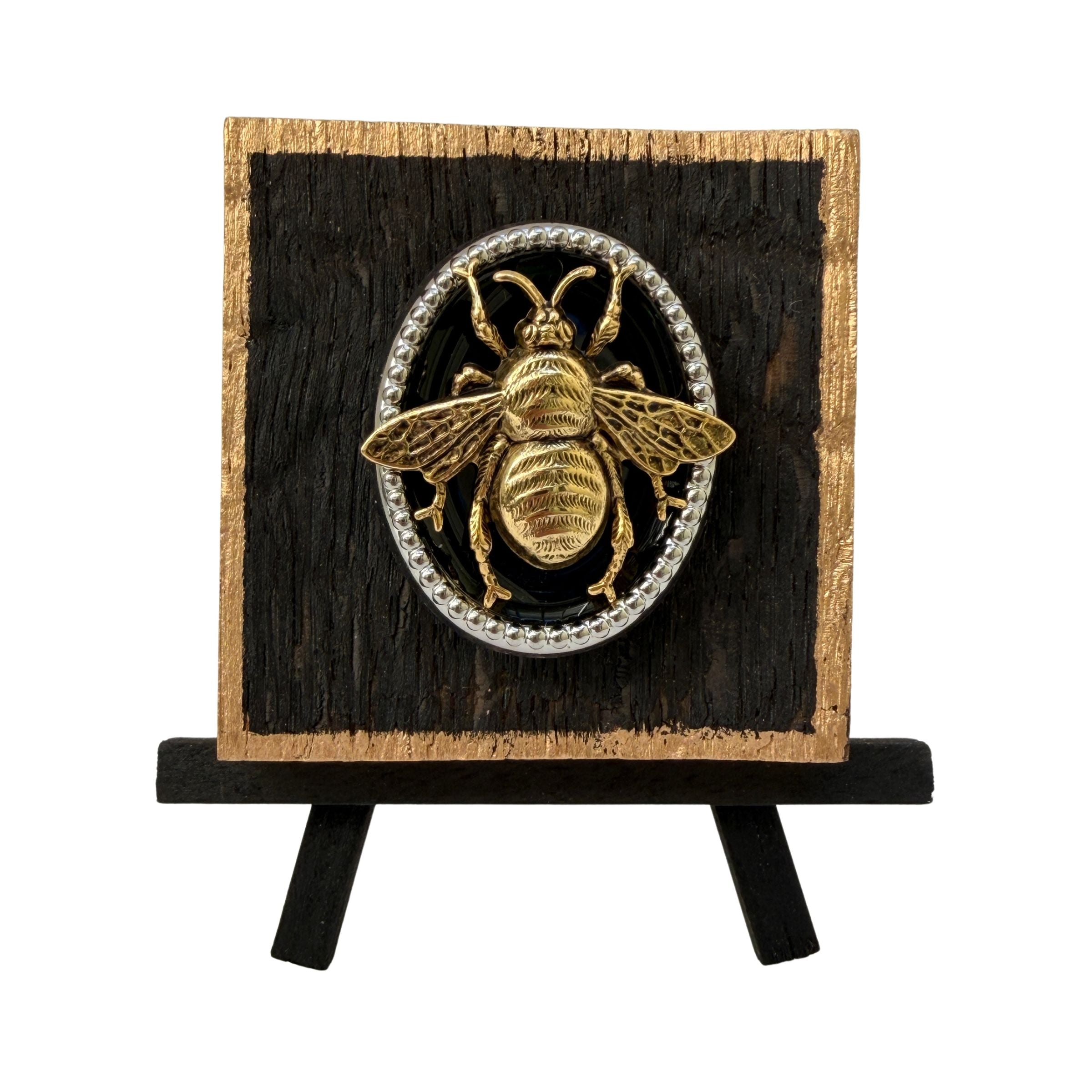Wooden art with Gold bee on silver medallion with Black enamel