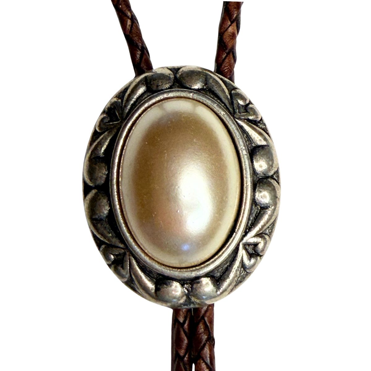 The Classic Legacy Bolo tie with pearl-like stone and braided leather is a great accessory to wear to a Western-themed wedding or event.