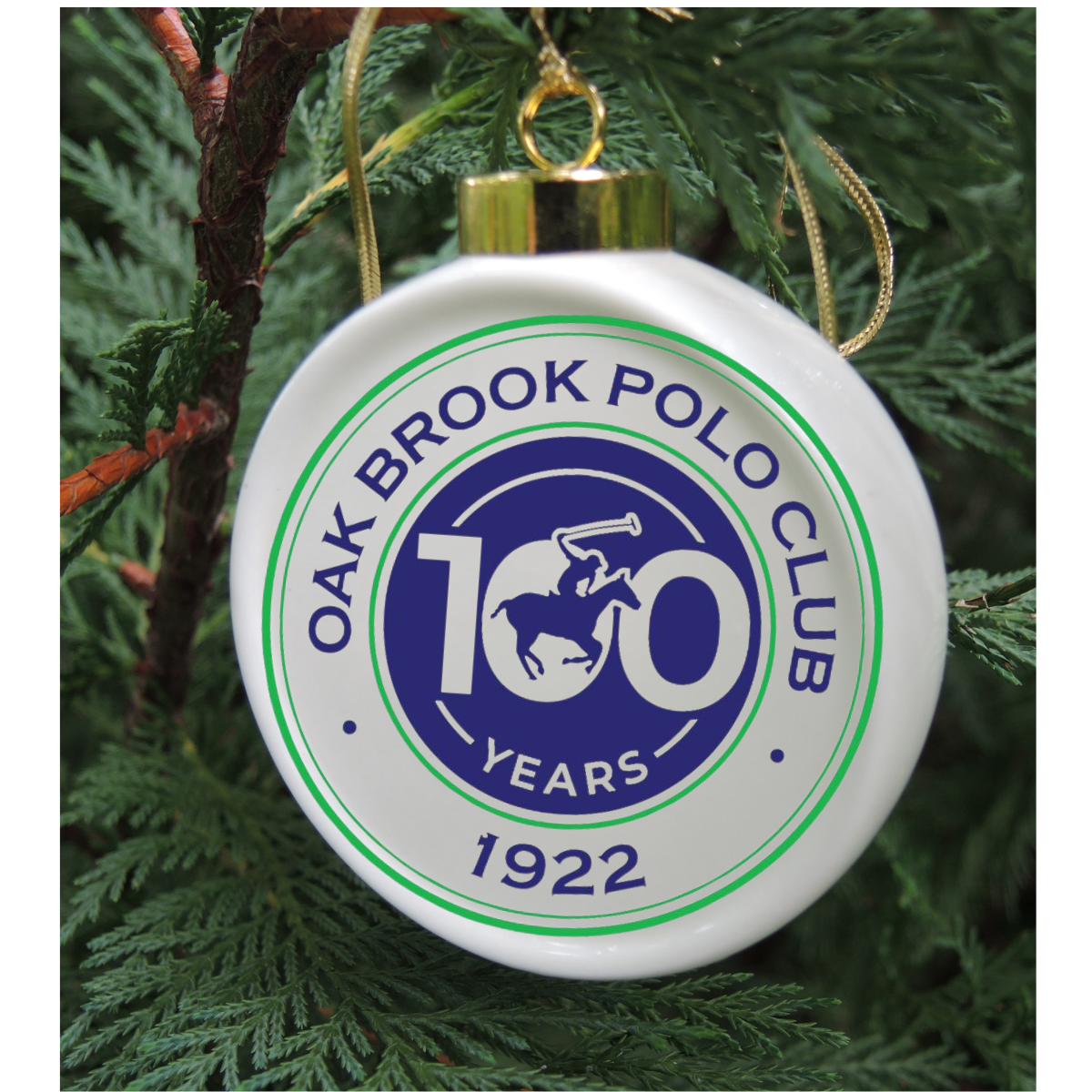 The Custom China Christmas ornament is a porcelain drum shape ornament featuring your logo or art.  Each is hand-crafted and comes in a gift box with a clear lid.   Shown is the design for Oak Brook Polo Club.