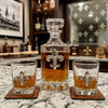 the fleur de lis decanter set includes a large decanter and two bourbon glasses.  This is perfect for a home bar in Louisville KY, a city that celebrates the fleur de lis