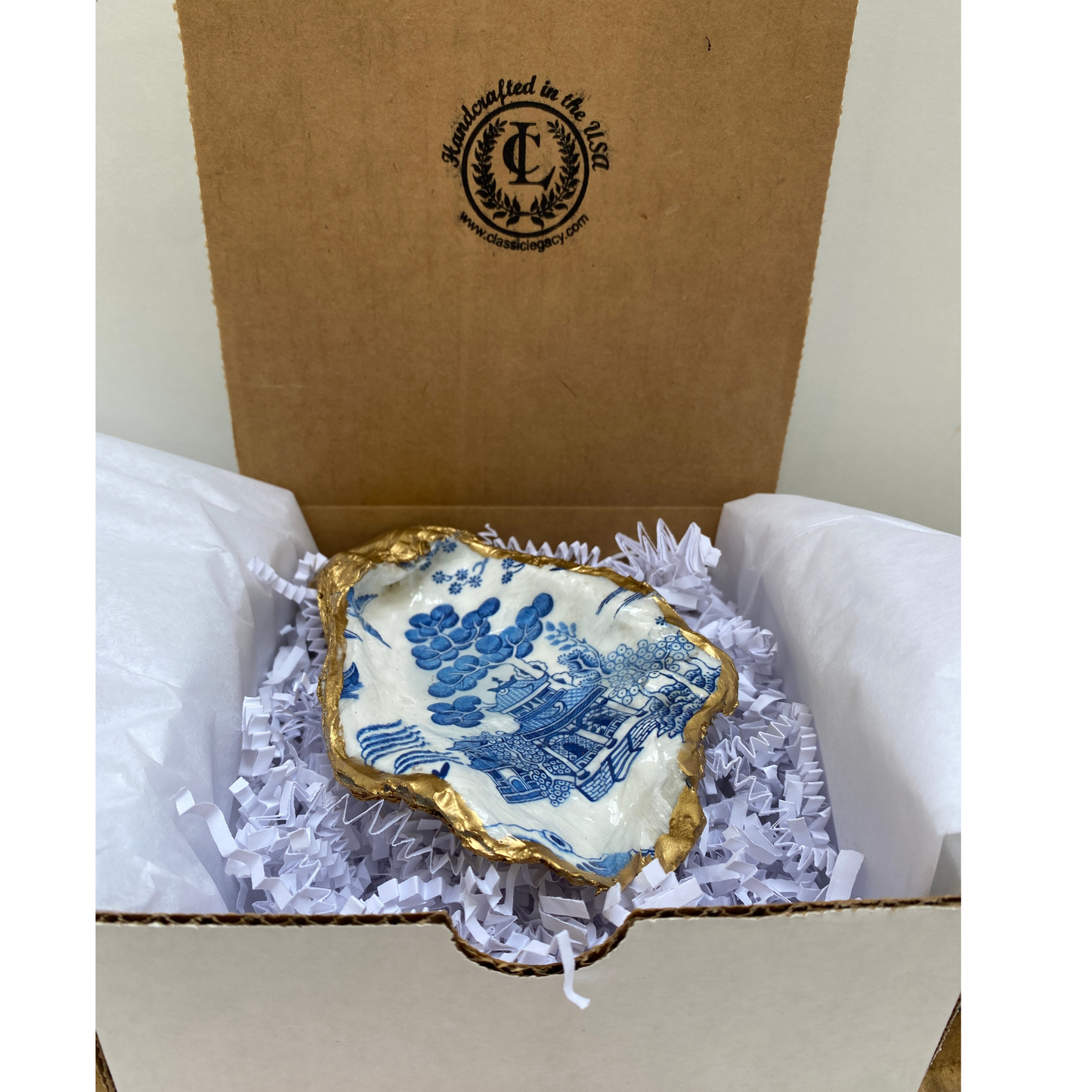 Blue and white Chinoiserie Oyster Shell art that is used for jewelry dish comes in a white gift box.