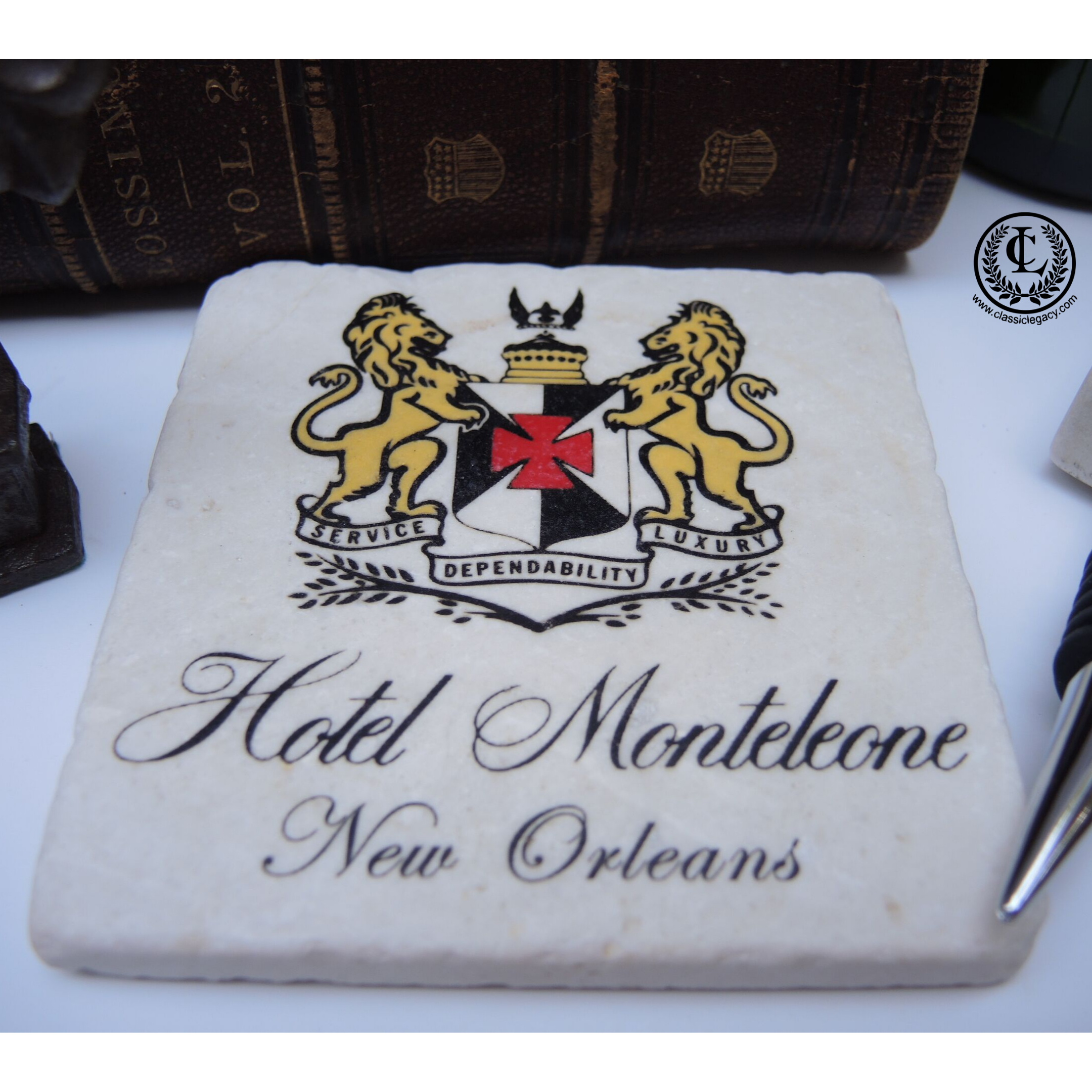 The Classic Legacy marble coasters feature your art or logo.  Each is handcrafted and made in the USA.   This shows the coaster designed for The Hotel Monteleone in New Orleans