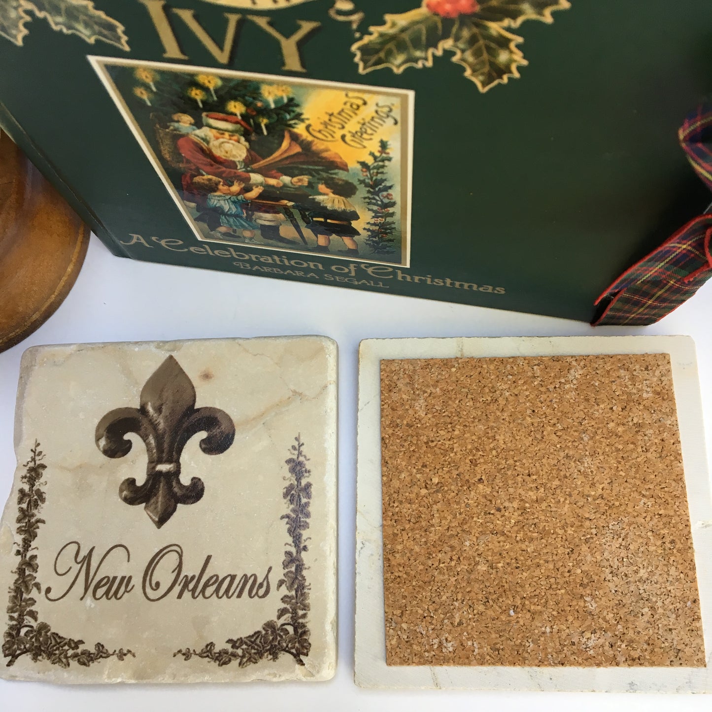 Marble coaster designed especially for the city of New Orleans.  It features an image of a silver medallion and "New Orleans".  Each marble coaster is 4" x 4" and has cork backing.  It is perfect for hot drinks and cold drinks.