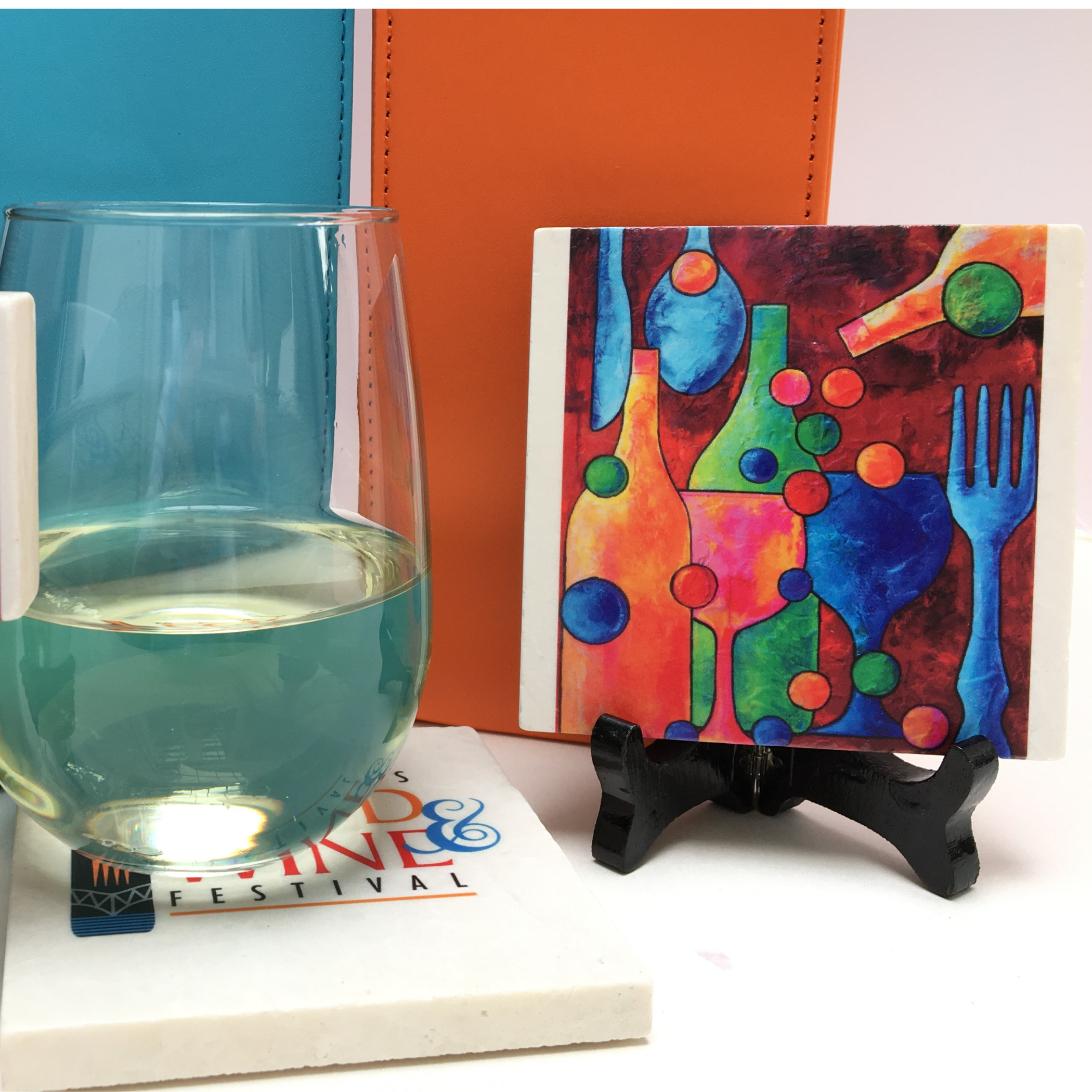 The Classic Legacy marble coasters feature your art or logo.  Each is handcrafted and made i the USA.   This shows a coaster designed for the Memphis art festival.