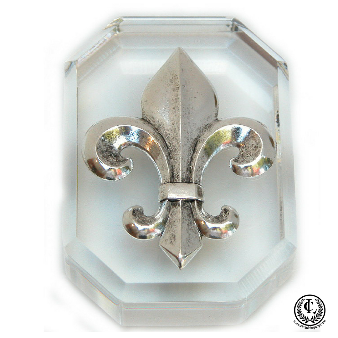 Clear acrylic paperweight  with large silver fleur de lis