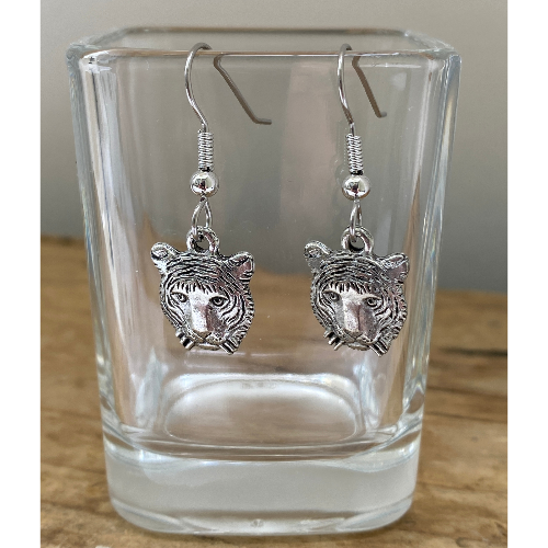 Tiger Earrings  shown hanging on small glass